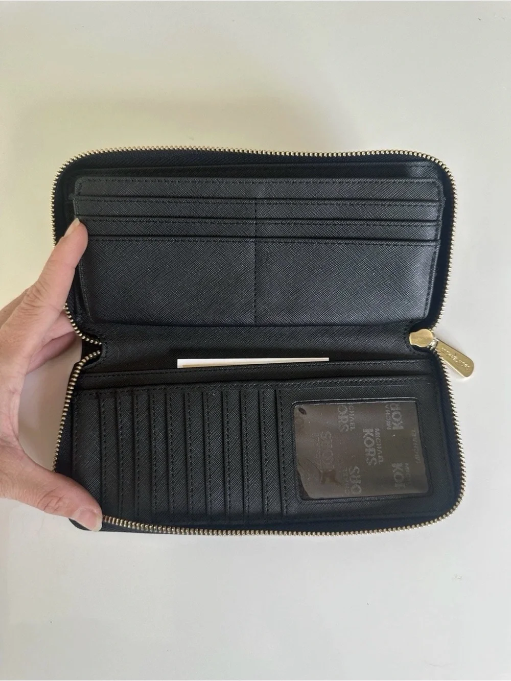 Michael Kors Black Pebbled Leather Zip Wallet with Gold Tone Zipper Pull